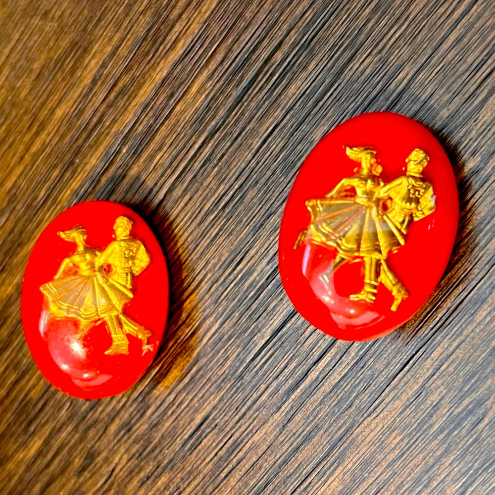 Vintage red clip on earrings with gold dancer